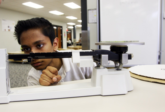 Metro High School Freshman Sujit Rao works on a lab project. Photos Ben French